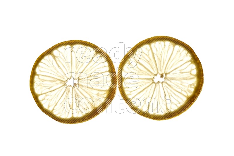 Lemon slices on illuminated white background