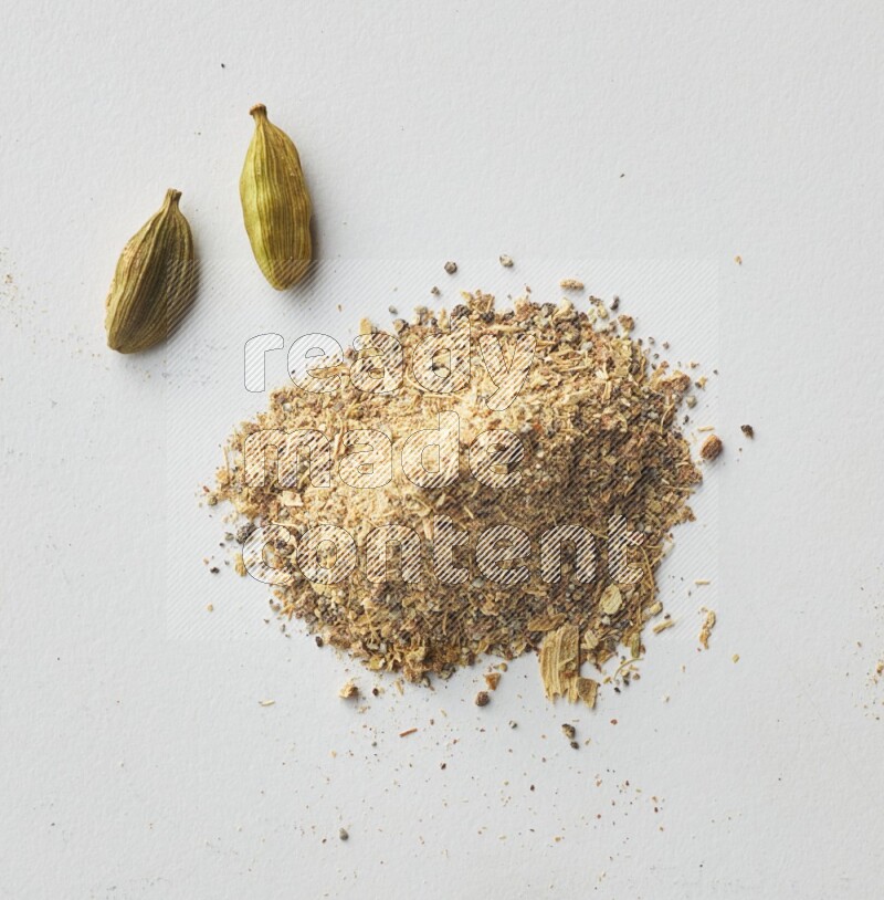 Top-view shot of Cardamon on white background