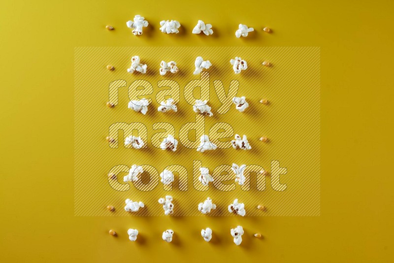 Popcorn flakes and seeds on a yellow background in different angles