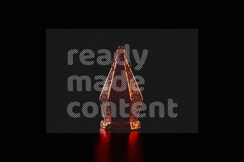 Ramadan lanterns with colored rim light against black background