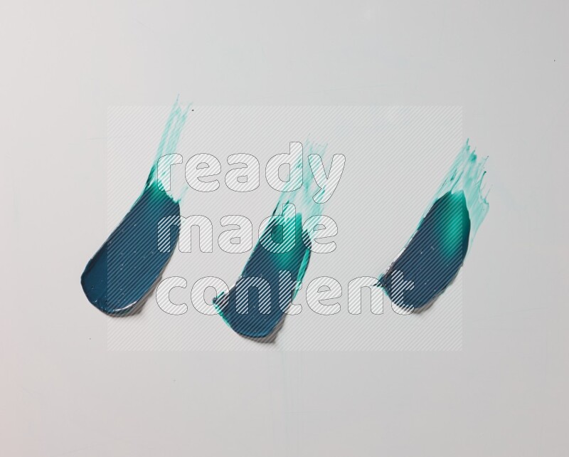Turquoise painting knife strokes on white background