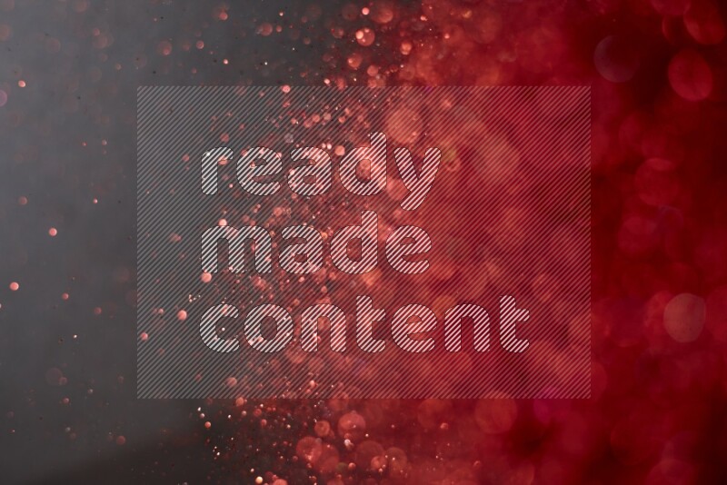 Red glitter powder isolated on black background