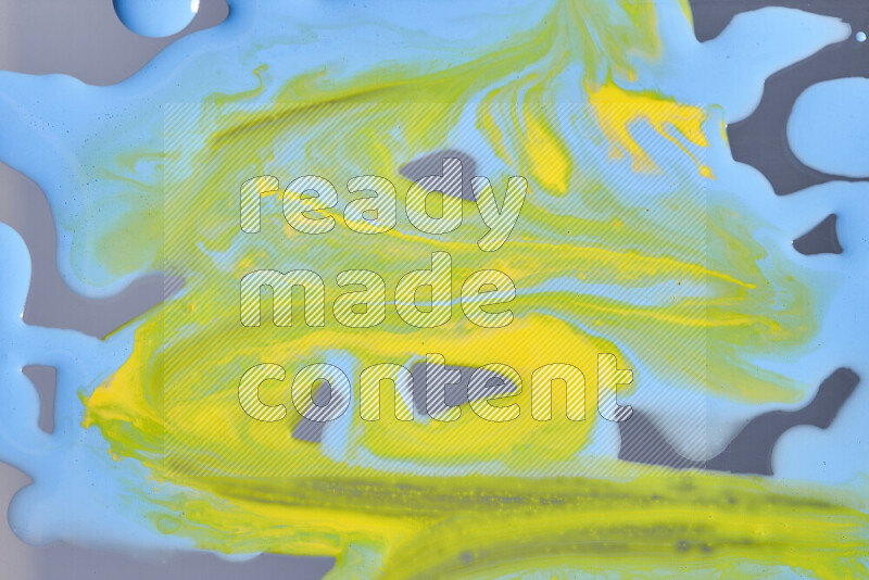 Abstract colorful background with mixed of yellow and blue paint colors