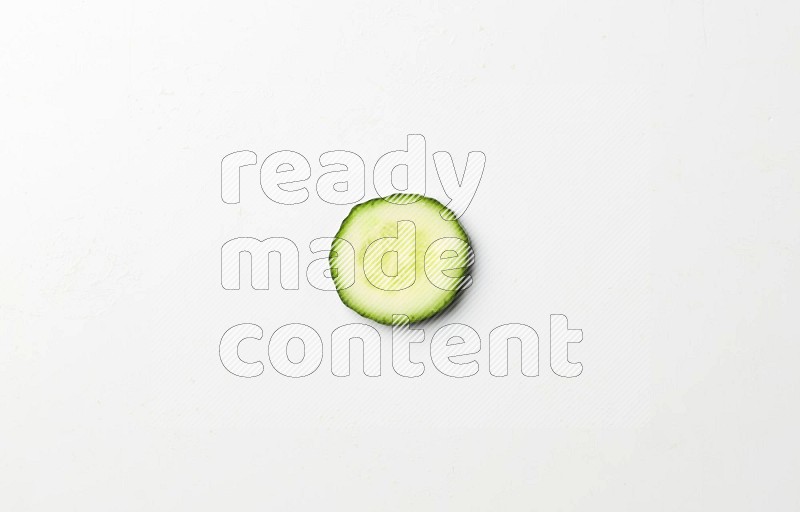 A cucumber slice on white background