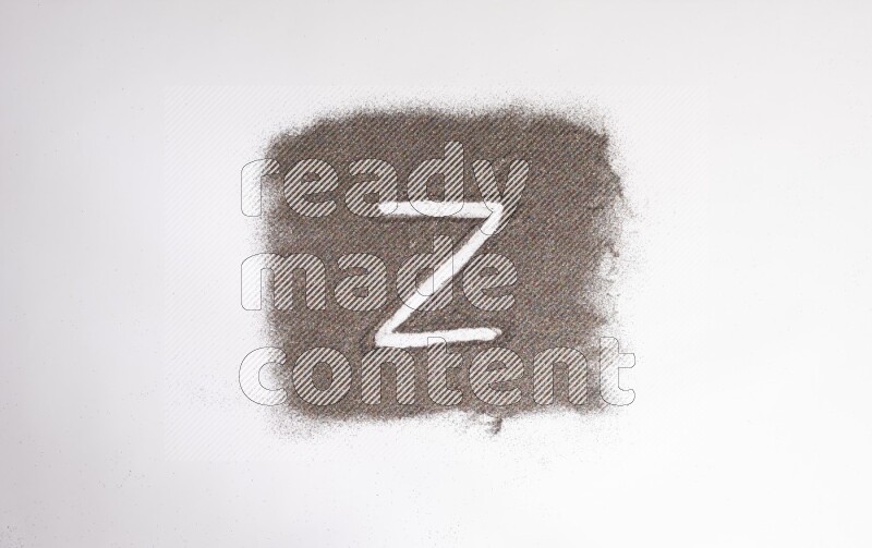 Alphabets written with glitter on white background