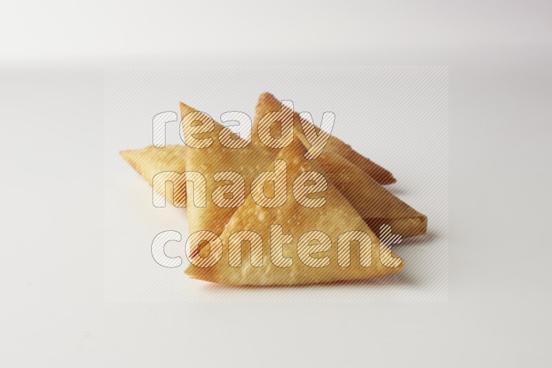 sambosas on a white background