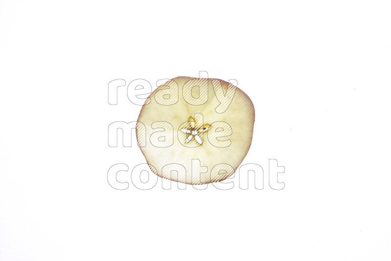 Apple slices on illuminated white background