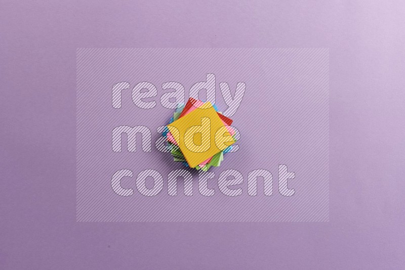 Multicolored sticky notes on purple background (Back to school)