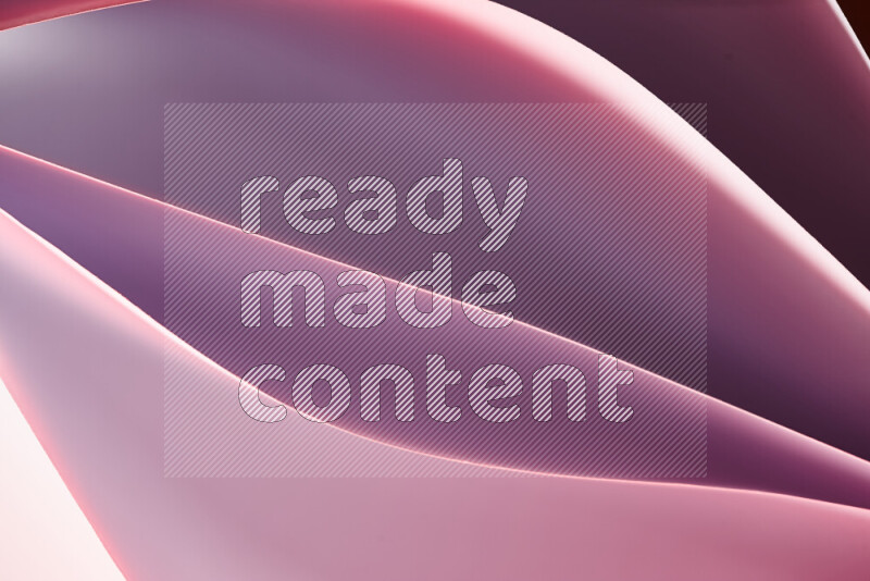 This image showcases an abstract paper art composition with paper curves in white and different warm gradients created by colored light