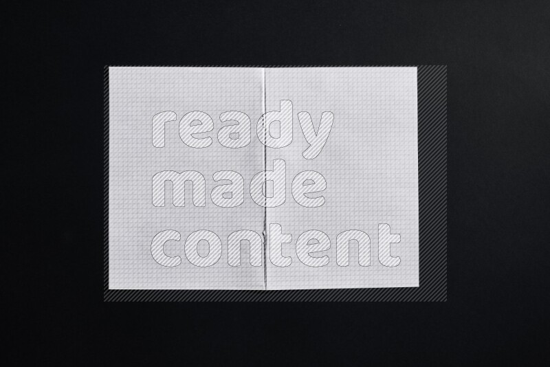 Notebook sheet on black background