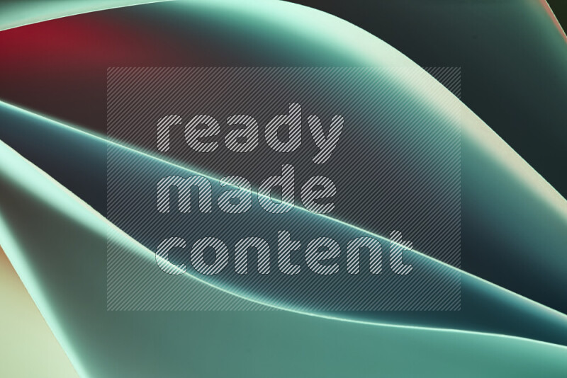 هذه الصورة تعرض تكوين فن الورق التجريدي مع منحنيات ورقية بتدرجات اللون الأخضر والأحمر المكونه بواسطة الضوء الملون