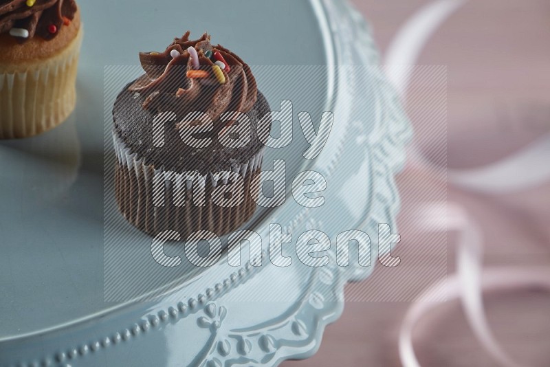 Chocolate mini cupcake topped with chocolate cream