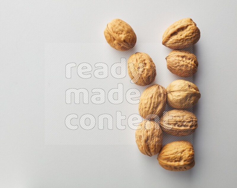 Top-view shot of walnut on white background