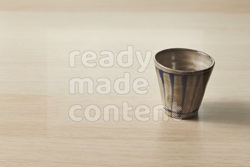 Pottery Cup on Oak Wooden Flooring, 15 degrees