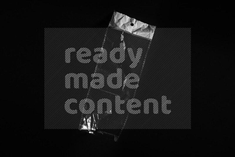 Transparent plastic textures on black background