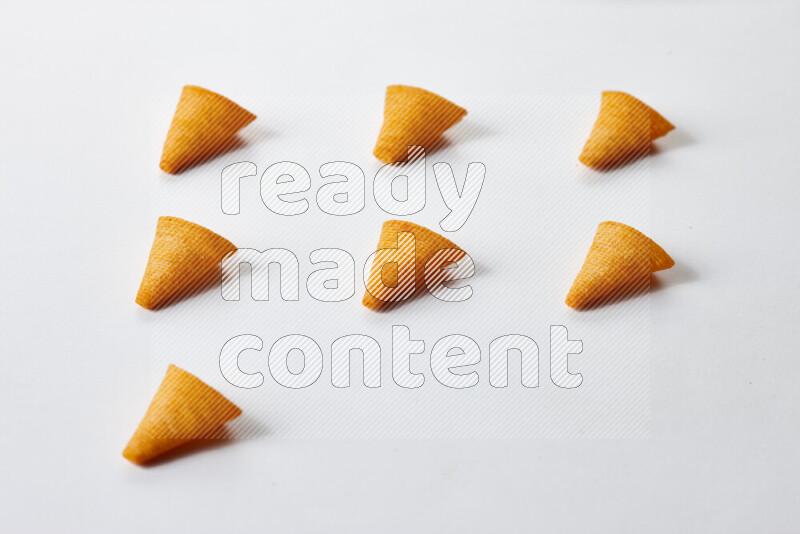 Assorted snacks on white background