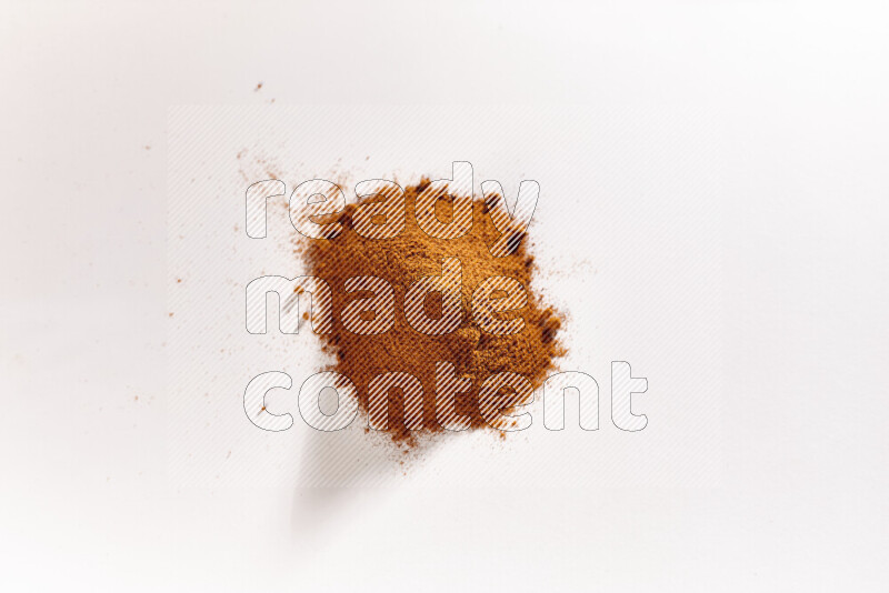 A bunch of ground paprika powder on white background