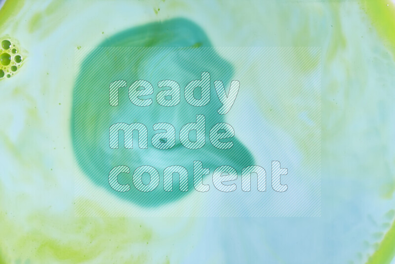 A close-up of abstract swirling patterns in green gradients