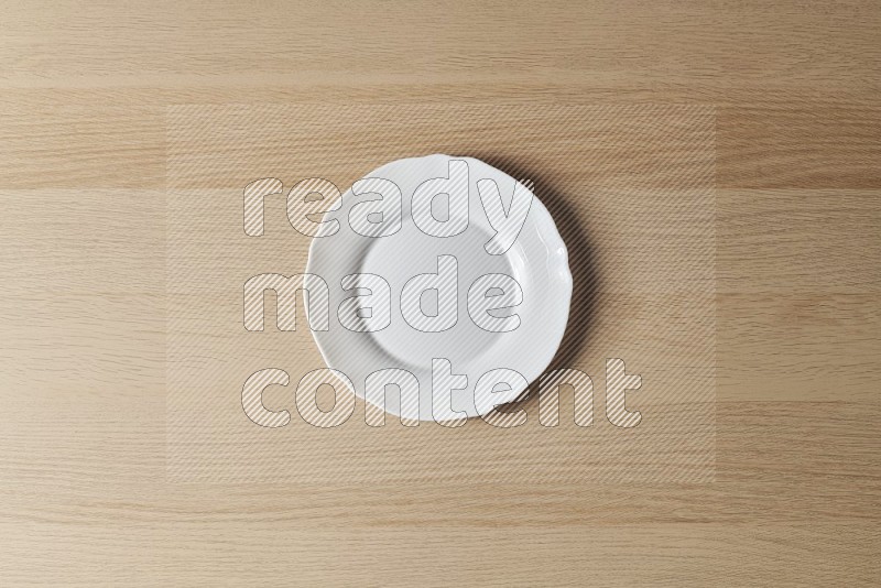 Top View Shot Of A White Ceramic Circular Plate on Oak Wooden Flooring