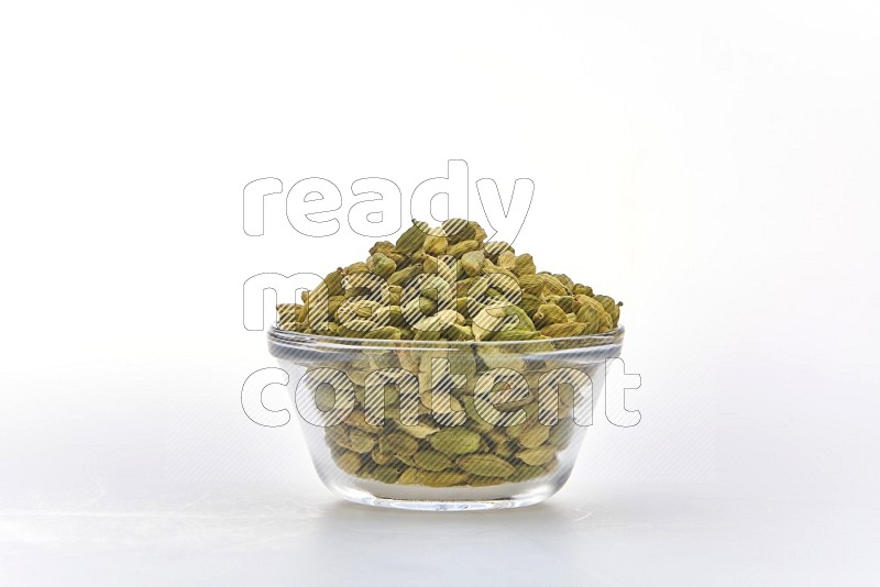 Cardamon in a container on white background