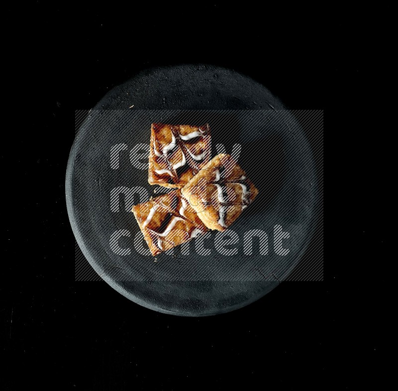 Top View of Gateaux Soiree on Black Flooring