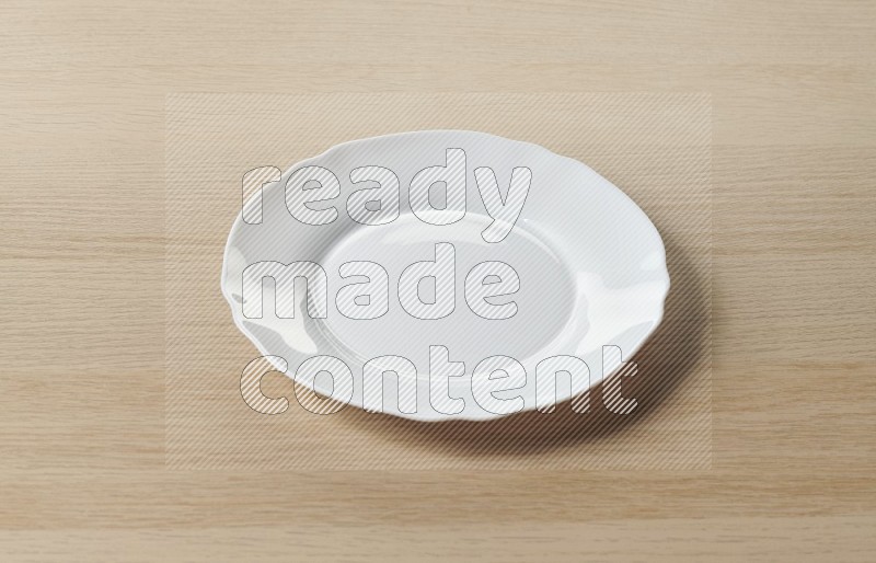 White Ceramic Circular Plate on Oak Wooden Flooring, 45 degrees