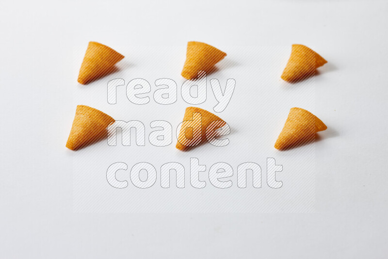 Assorted snacks on white background