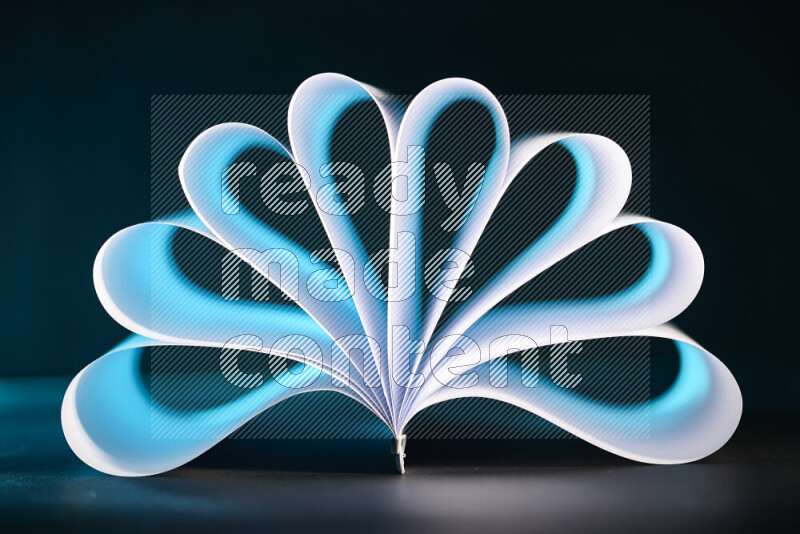 An abstract art piece displaying smooth curves in blue and white gradients created by colored light