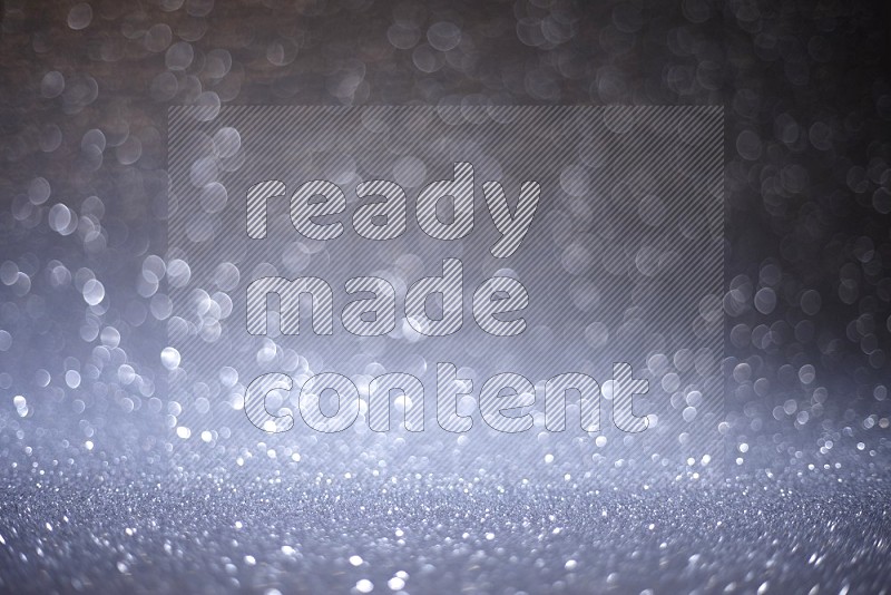 Silver glittery bokeh background