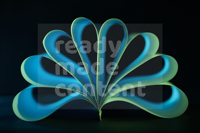 An abstract art piece displaying smooth curves in blue and green gradients created by colored light