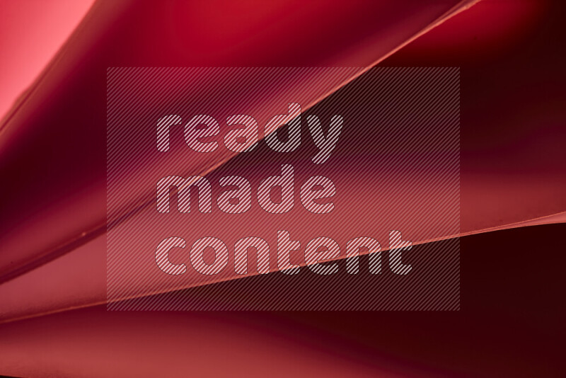 An abstract art piece displaying smooth curves in warm and cold gradients created by colored light