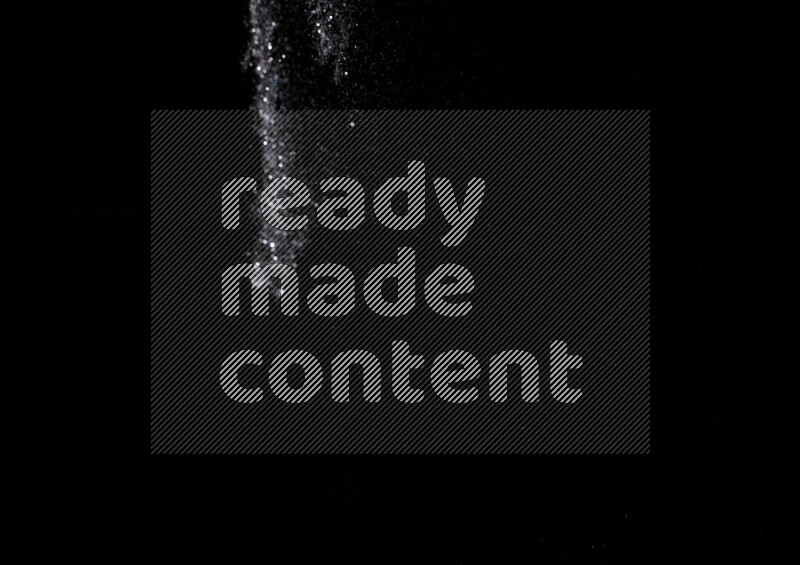 Silver glitter powder isolated on black background