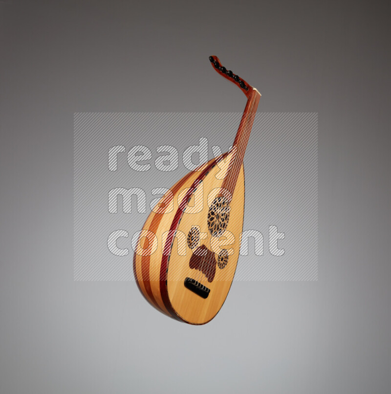 a wooden brown Oud on a gray background