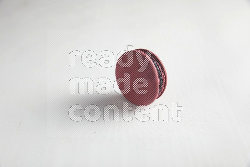 45º Shot of Red Cherry macaron on white background