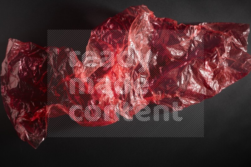 Colored plastic textures on black background