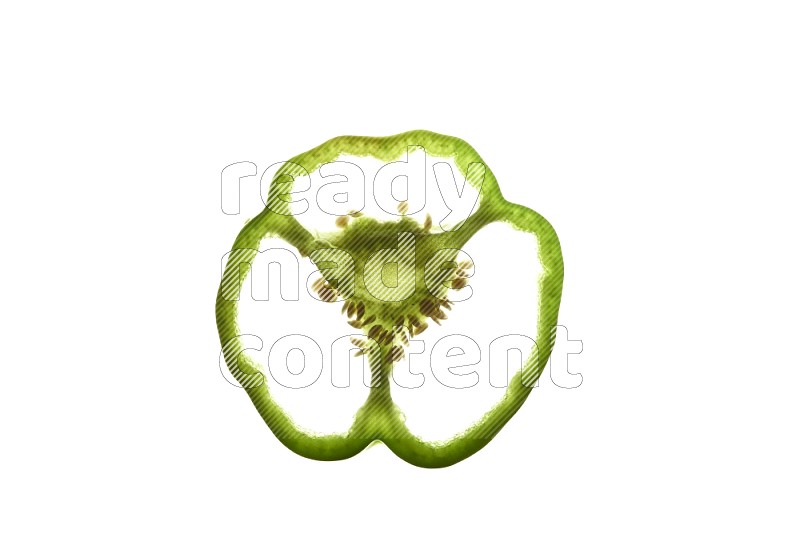 Green bell pepper slices on illuminated white background
