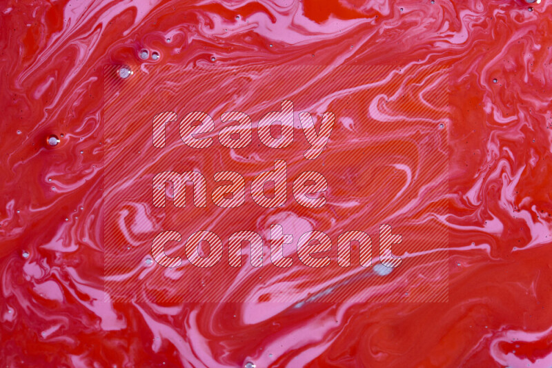 خلفية ملونة مع مزيج من ألوان الطلاء الوردي والأحمر