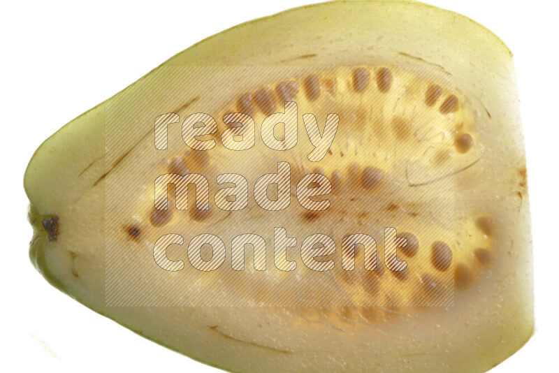Guava slices on illuminated white background