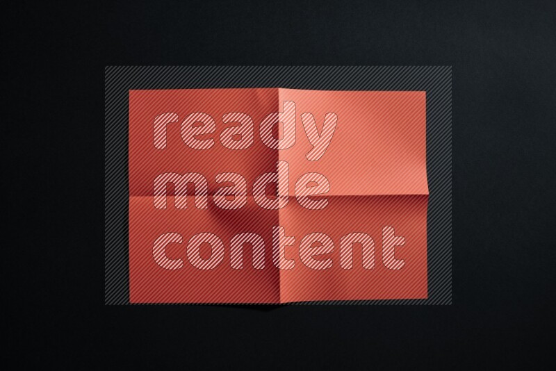 White paper sheet on black background