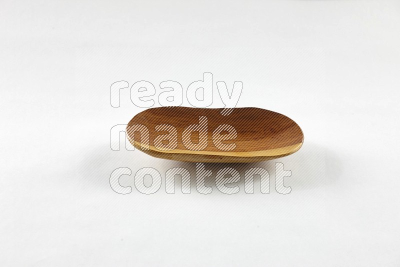 A wooden plate on white background