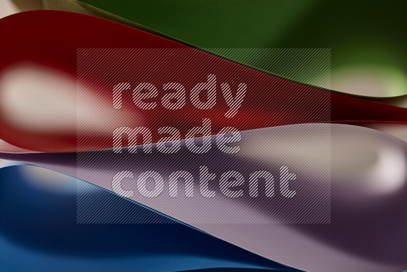 An abstract art showing colorful paper sheets arranged in an overlapping curves