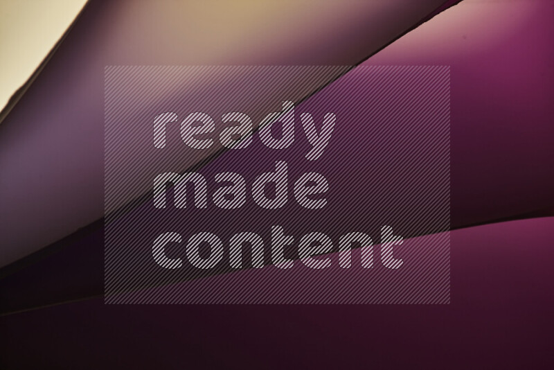 An abstract art piece displaying smooth curves in warm and cold gradients created by colored light