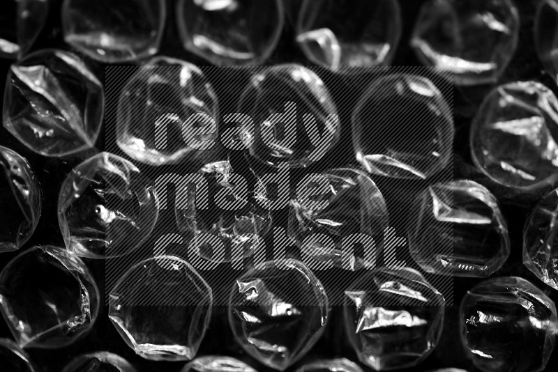 Bubble wrap texture on black background