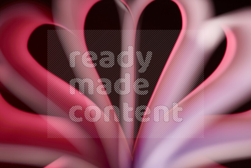 فن تجريدي يعرض منحنيات وتدرجات اللون الوردي والأحمر مكونه بضوء ملون
