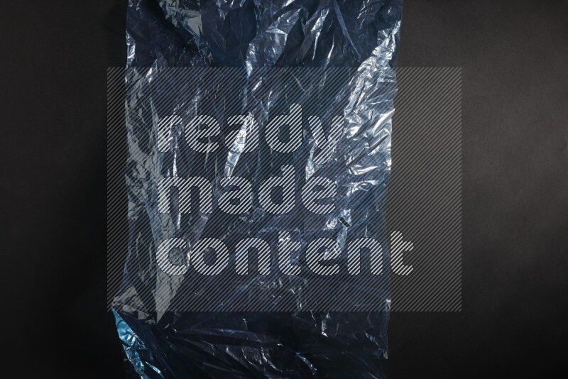 Colored plastic textures on black background