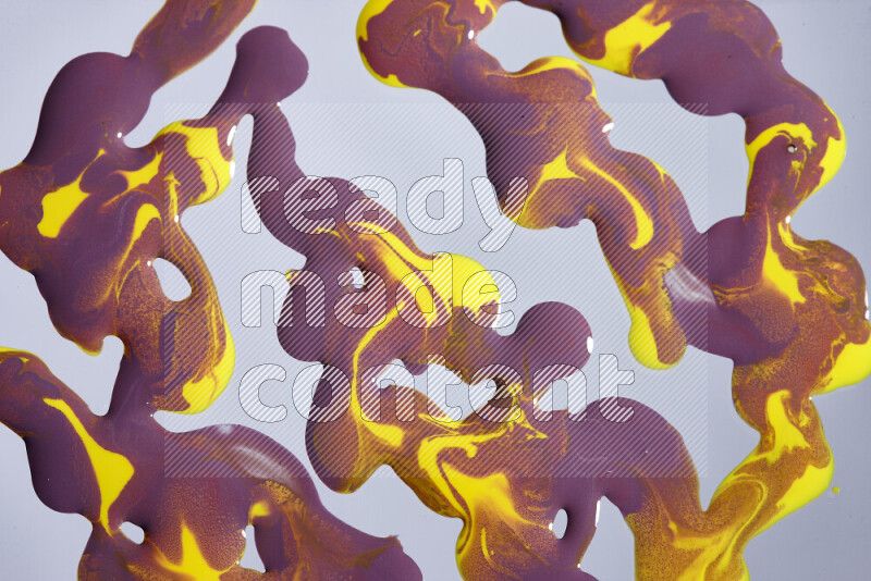 Abstract colorful background with mixed of purple and yellow paint colors