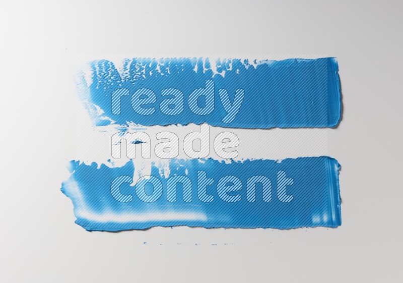 Blue painting knife strokes on white background