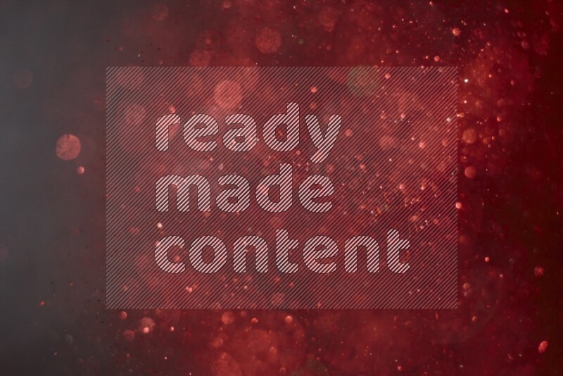 Red glitter powder isolated on black background