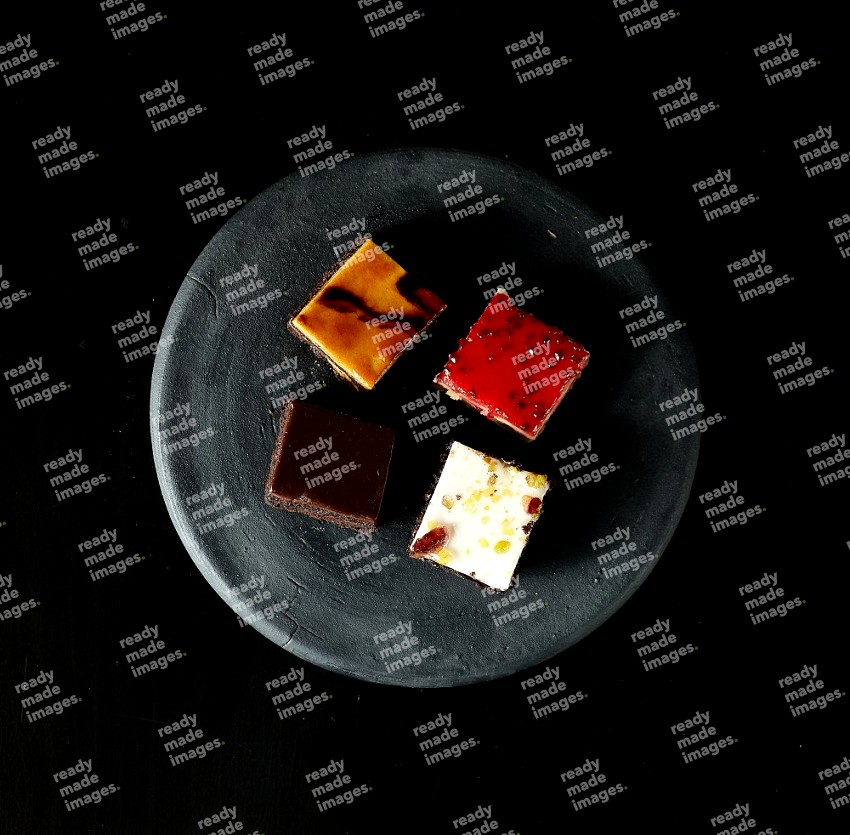 Top View of Gateaux Soiree on Black Flooring
