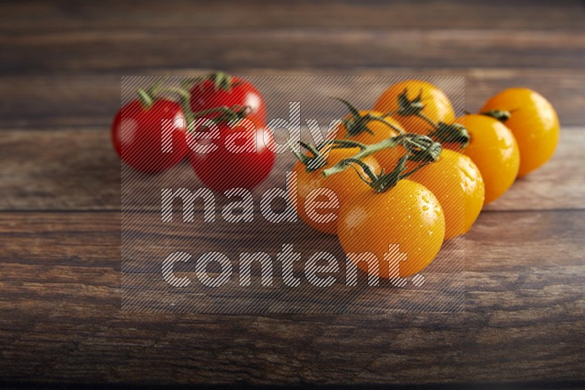 Mixed cherry tomato veins on a textured wooden background 45 degree